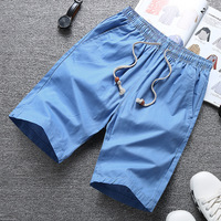 Shorts de sport pour hommes personnalisés en gros, à taille élastique, imprimés, séchage rapide, pour la course, la gym et la plage, en polyester/coton, à bas prix