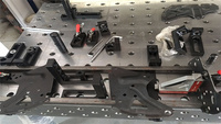 Table de travail de soudage 3D avec base optimisée pour le soudage de pièces de machines tout-terrain et le processus de fabrication
