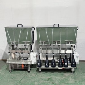 Produits à bas prix, petite machine de remplissage pneumatique à gravité à 4 têtes pour le remplissage de <span class=keywords><strong>vin</strong></span>, whisky, liqueurs, machines de remplissage de bouteilles - Product Image 5