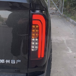 ไฟท้ายรถยนต์ Xintai LED สำหรับ Nissan Navara ปี 2019 เลนส์รมดำ อะไหล่แท้จากโรงงาน - Product Image 1