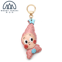 Porte-clés léger et portable en cuir véritable avec anneau métallique, logo personnalisé de haute qualité, breloque de sac mignonne et amusante, modèle Yanzhi