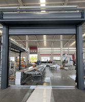 Porte de garage moderne à spirale à grande vitesse, isolée en mousse PU, en alliage d'aluminium de 100 mm, coupe-vent, automatique, à enroulement, pour villa