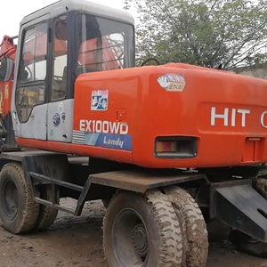 รถขุดตีนตะขาบฮิตาชิ EX100WD มือสอง สีส้ม พร้อมสติ๊กเกอร์เตือน - Product Image 2