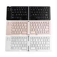Nouveau mini clavier portable sans fil rechargeable à double pliage pour tablettes iPad et ordinateurs portables
