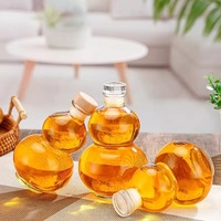 Bouteilles en verre transparentes en forme de gourde de 350 ml, 375 ml, 500 ml avec bouchon en liège pour jus, boissons, lait, thé
