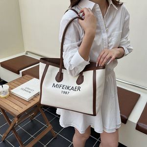กระเป๋าโท้ทสำหรับเดินทาง ช้อปปิ้ง ทำธุรกิจ  ขนาดใหญ่ ใส่ของได้เยอะ  พร้อมโลโก้สั่งทำพิเศษ สำหรับผู้หญิง - Product Image 5