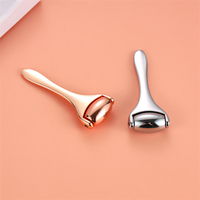 Rouleau de massage facial en métal pour la beauté, outil de massage facial en alliage de zinc, masseur de crème pour les yeux pour salon et spa, vente directe usine