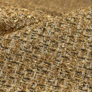 Tessuto in Tweed dorato brillante 100% tessitura in fibra di poliestere con filo metallico adatto per abiti da ragazza e per essere utilizzato come copridivano - Product Image 2