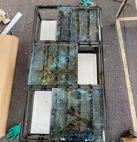Dalles de pierre de granit bleu lémurien Labradorite de Madagascar Carrelage de table en pierre de marbre naturel irisé bleuâtre
