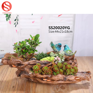 <span class=keywords><strong>Amazon</strong></span> Venta caliente <span class=keywords><strong>de</strong></span> resina grande <span class=keywords><strong>de</strong></span> plantas bonsai pot pájaro suculentas hierba flor olla con música - Product Image 5