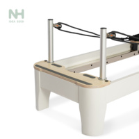 Reformer de Pilates en bois professionnel personnalisable, équipement de rééducation durable pour studio de yoga ou de gym