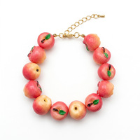 Trendy kleurrijke zomerse armband van messing en hars met fruitkraaltjes, boho armband, stapelbare kraalarmband voor unisex