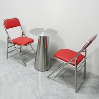 Table de salle à manger extérieure ronde compacte en acier inoxydable, style industriel moderne et épuré, 4 places, pour café et mobilier de salle à manger