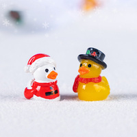 7 figuras de patos de resina estilo Papá Noel en miniatura con sombrero, adornos para casa de muñecas, decoraciones navideñas y manualidades.
