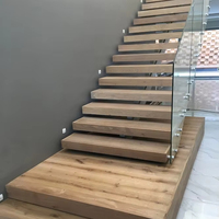 Escaliers droits préfabriqués d'intérieur en bois de chêne massif Conception flottante moderne avec garde-corps en verre pour villas Matériau métallique