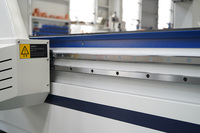 Routeur CNC 4 axes 1500x3000mm avec broche horizontale 9KW, broche ATC + système de contrôle Syntec 60W, table à vide pour le travail du bois
