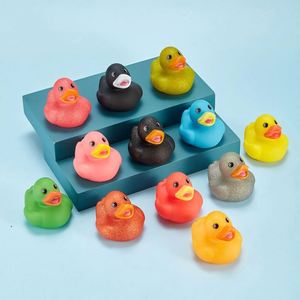 5.5cm 2 Inch Customized Batch Print Logo PVC Glitter Rubber Duck Form Bathtub <b>Bath</b> Toys with Pattern Designs Applied - Product Image 1