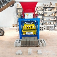 Presse à briques semi-automatique multifonction 4-35A avec trémie - pour la fabrication de pavés, de blocs creux et de briques pleines avec une seule machine