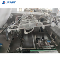 Machine automatique d'emballage de pochettes de pop-corn snack alimentaire pomme de terre chips noix avec emballage en plastique scellant à l'azote Composants de base PLC