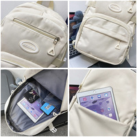 Mode haute capacité cartable nouveau sac à dos unisexe ordinateur pochette d'ordinateur Oxford lycéens lettre sac à dos Sport