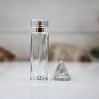 Vente en gros de flacons de parfum en verre triangulaires de 30 ml/40 ml, boîte-cadeau personnalisée, couvercle, crème pour le soin de la peau, diffuseur, surface sérigraphiée