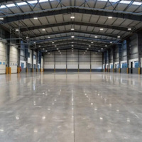 Bâtiment en structure acier préfabriqué DAC pour entrepôts et ateliers avec un design moderne, une construction durable et une garantie de 2 ans