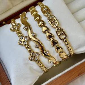 สร้อยข้อมือสแตนเลสกันน้ำสร้อยข้อมือกลวงรูปหัวใจดอกไม้สร้อยข้อมือเพชรหรูหราน้ำหนักเบาสร้อยข้อมือสุภาพสตรี - Product Image 1