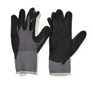 Le blanc d'aloès de qualité alimentaire tricoté en nylon noir convient aux gants en nitrile à pois sans poudre