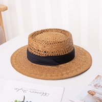 Chapeau de paille femme tressé plage chapeau de cowboy été britannique rétro frais petit haut parasol creux chapeau de paille en gros