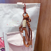 Porte-clés en paracorde avec poupée en peluche, ornement suspendu en corde tressée, cordon en nylon, mousqueton, breloque de sac, cadeau style Instagram