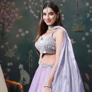 Elegant <b>White</b> Embroidered <b>Lehenga</b> Choli with Sleeveless Sweetheart Neckline Blouse and Matching Dupatta for Women - Product Image 1