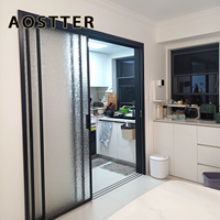 Porte de séparation en verre télescopique en aluminium AOSTTER avec système coulissant multi-voies et grande surface ouverte pour salon de villa
