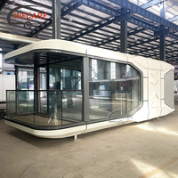 Wecare 40ft Solar Powered Smart Capsule Space Cabin Tiny House Space Capsule House avec remorque