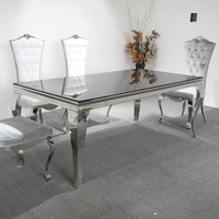 Top en verre noir avec miroir et 6 chaises en acier inoxydable, Table à manger moderne en acier inoxydable, 4 places avec pieds de serpent