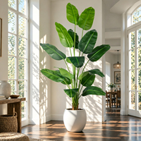Plante artificielle d'oiseau de paradis faite à la main sans entretien, faux arbre tropical dans un pot noir pour la décoration moderne du salon OEM