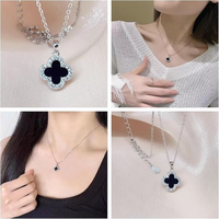 Collier trèfle à quatre feuilles en cuivre plaqué or 18 carats, onyx noir, coquille blanche, étanche, pendentif de luxe en zircon cubique, bijoux pour femme 2026