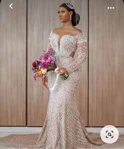 Nuevo Vestido de Novia de Lujo de Alta Gama para Comercio Exterior, Personalizado, Estilo Princesa con Tutú, Top de Perlas y Cola Grande - Product Image 1