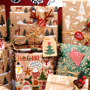 Venta al por mayor 80g Navidad oro estampado papel Kraft 43*300cm regalo lujo embalaje personalizado rollo de papel de regalo - Product Image 3