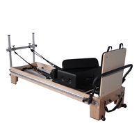 Reformer de Pilates professionnel en bois d'érable équilibré, couleur et logo personnalisables, équipement robuste pour l'entraînement au Pilates