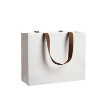 Sac à main en carton ondulé biodégradable haut de gamme personnalisable pour le commerce extérieur, impression de logo pour la promotion de vêtements et de cadeaux, vente en gros