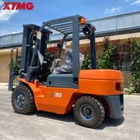 Chariot élévateur diesel XTMG 3T avec capacité de montée de 20 % et transmission mécanique hydraulique pour chargement sur rampes raides