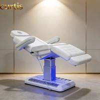 Table de massage électrique inclinable moderne pour salon de beauté et spa, 3 moteurs, en cuir PU et acier inoxydable, pour salon.