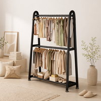 Porte-manteau mural de qualité supérieure pour la vente au détail, finition mate noire, construction en tube d'acier thermolaqué, support pour vêtements et objets décoratifs