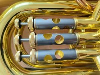 Bantalan/stiker *mouthpiece* silikon *food-grade* dengan logo kustom untuk klarinet dan saksofon (bass, tenor, dan alto)—aksesor