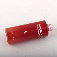 OEM personnalisé 30ml fond de teint plat rouge bouteille pompe en verre forme de cylindre vide pour emballage de crème de soin de la peau modèle 30g