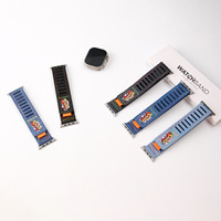 Bracelet de rechange élégant en jean style graffiti pour Apple Watch, avec motifs imprimés uniques, idéal pour un usage décontracté