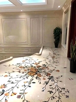 Médaillon en marbre découpé au jet d'eau pour sol d'hôtel, motif floral