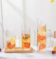 2025 à la mode à haute teneur en borosilicate Double paroi avec théière en verre à jante dorée et bouilloire nouveau pichet en verre Design pour les ménages