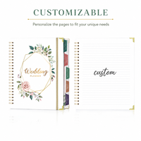 Carnet de planification de mariage OEM avec couverture blanche et motifs floraux, fabriqué par le fabricant