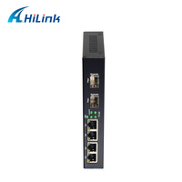 Gigabit Ethernet Fiber Optical Media Converter 4x10/100/1000Base-T & 2 X 1000Base-Fx GE SFP HL MC24G-SFP